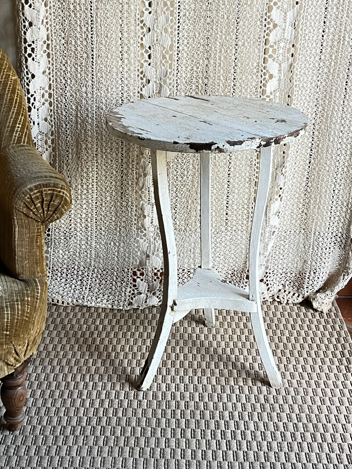 Small side table with an antique finish
