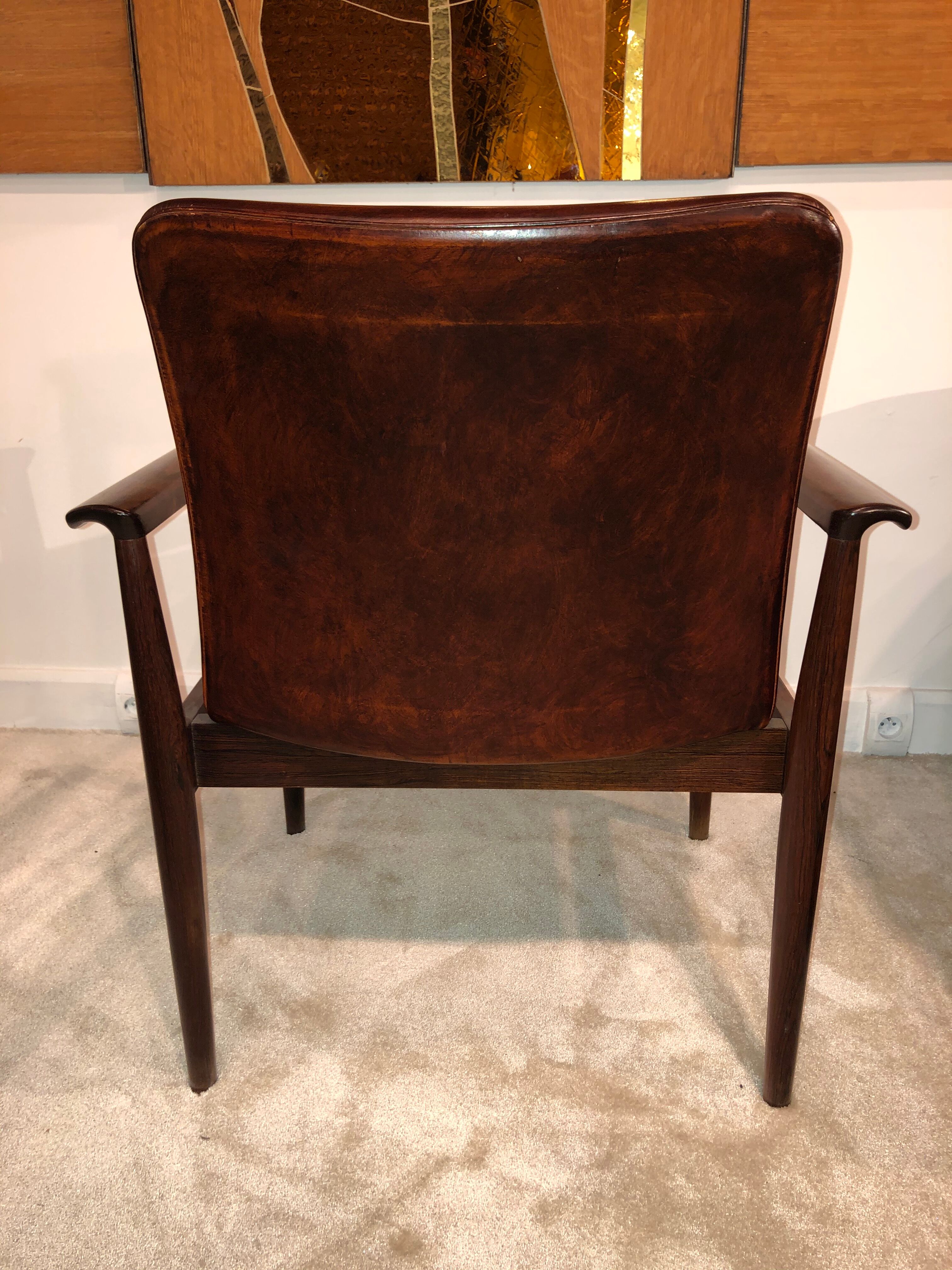 Finn Juhl's "Diplomat" armchair from the 1960s in solid rosewood and leather
