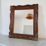 Carved wooden mirror
