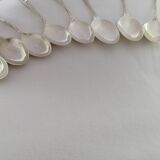 8 small silver spoons