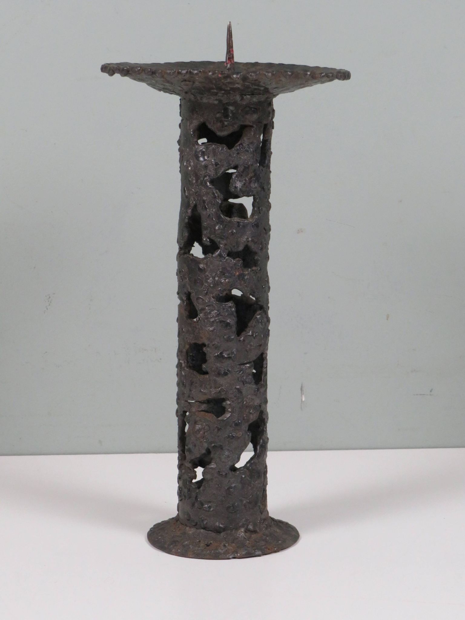 Brutalist wrought iron chandelier, European craftsmanship, 1960s.
