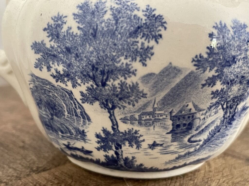 Teapot, milk pot and sugar bowl