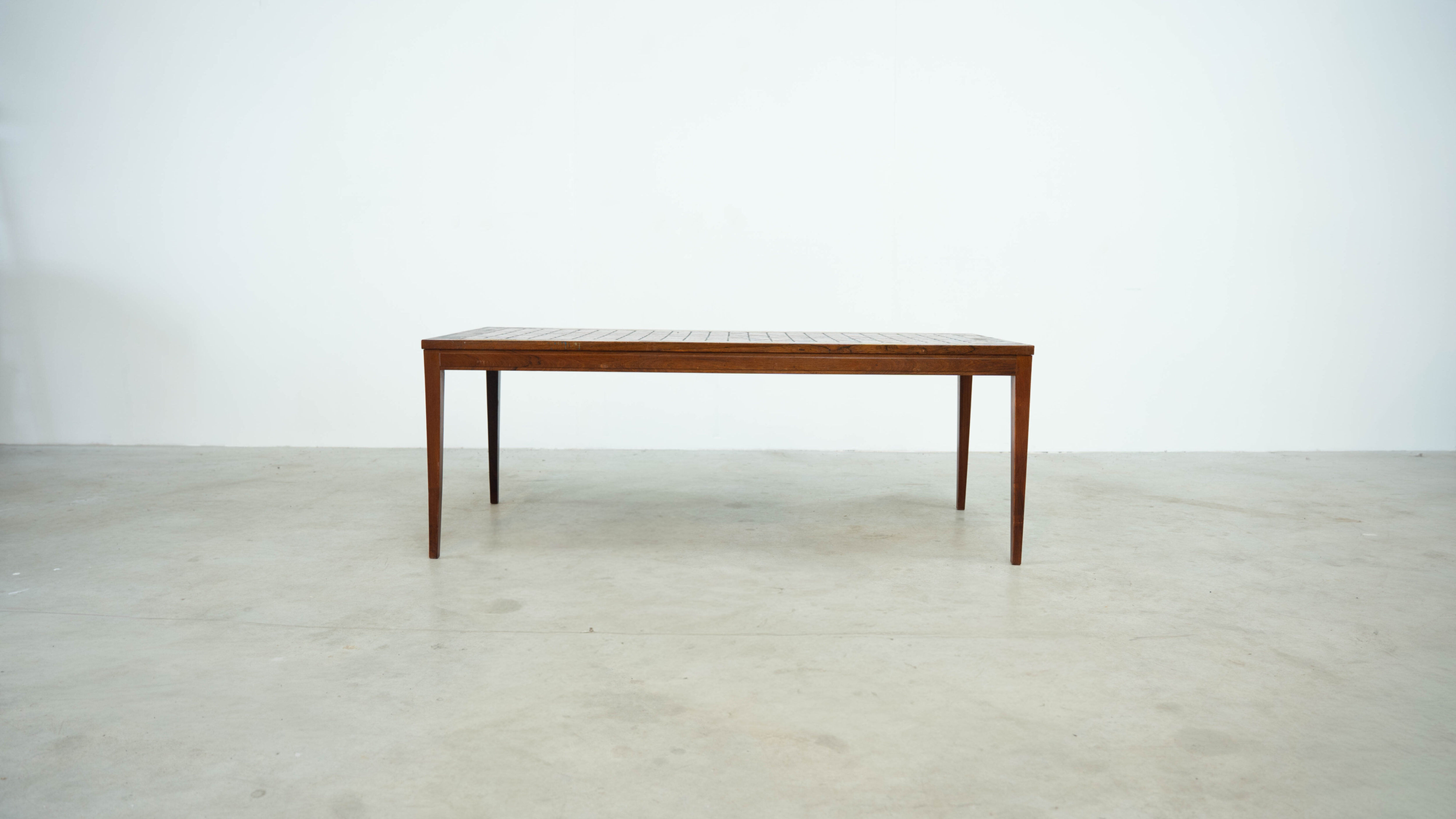 Danish red ceramic and teak coffee table