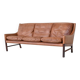 Canapé scandinave trois places en palissandre et cuir marron Danemark 1960
