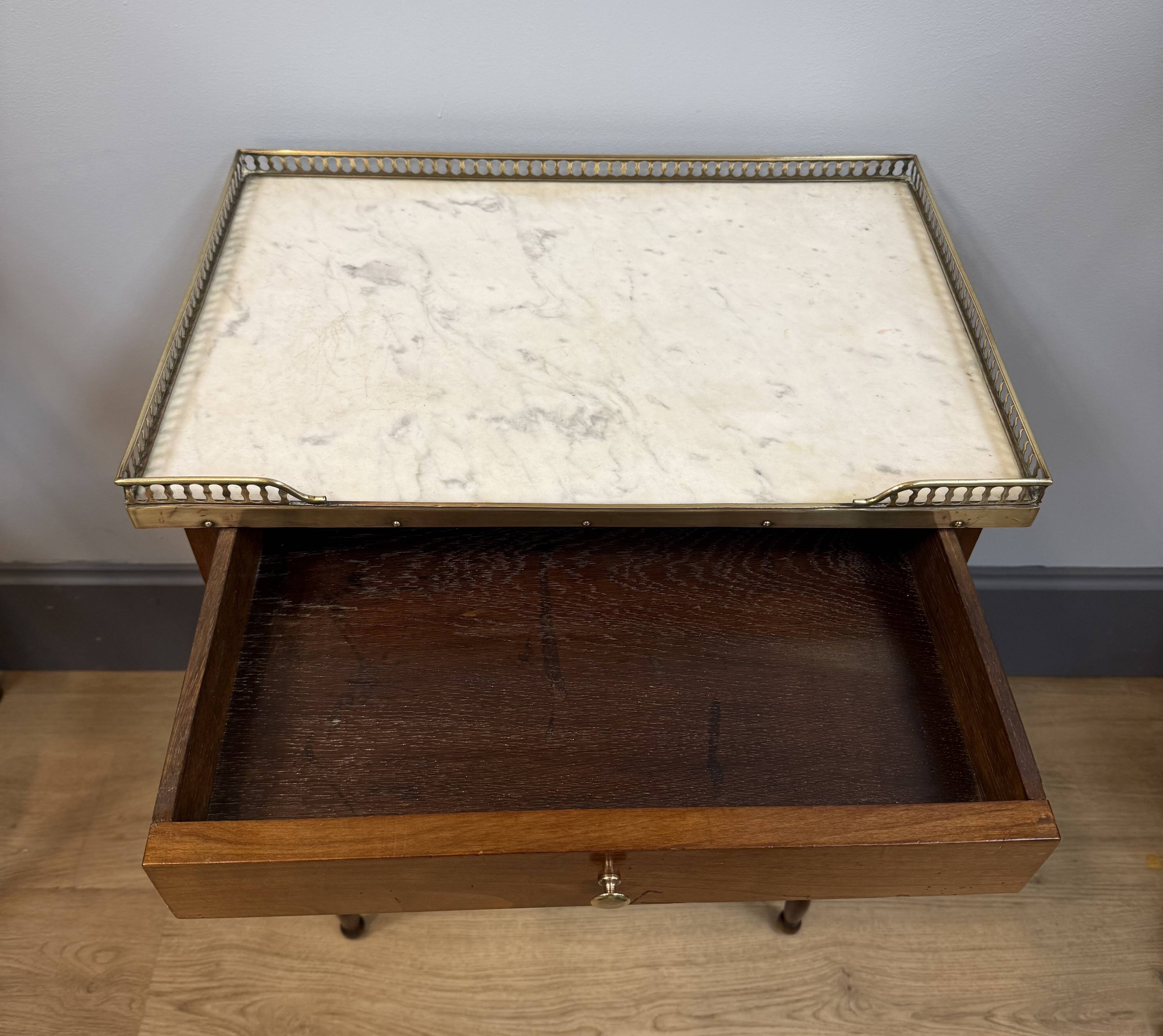 Small mahogany side table in Louis XVI style.