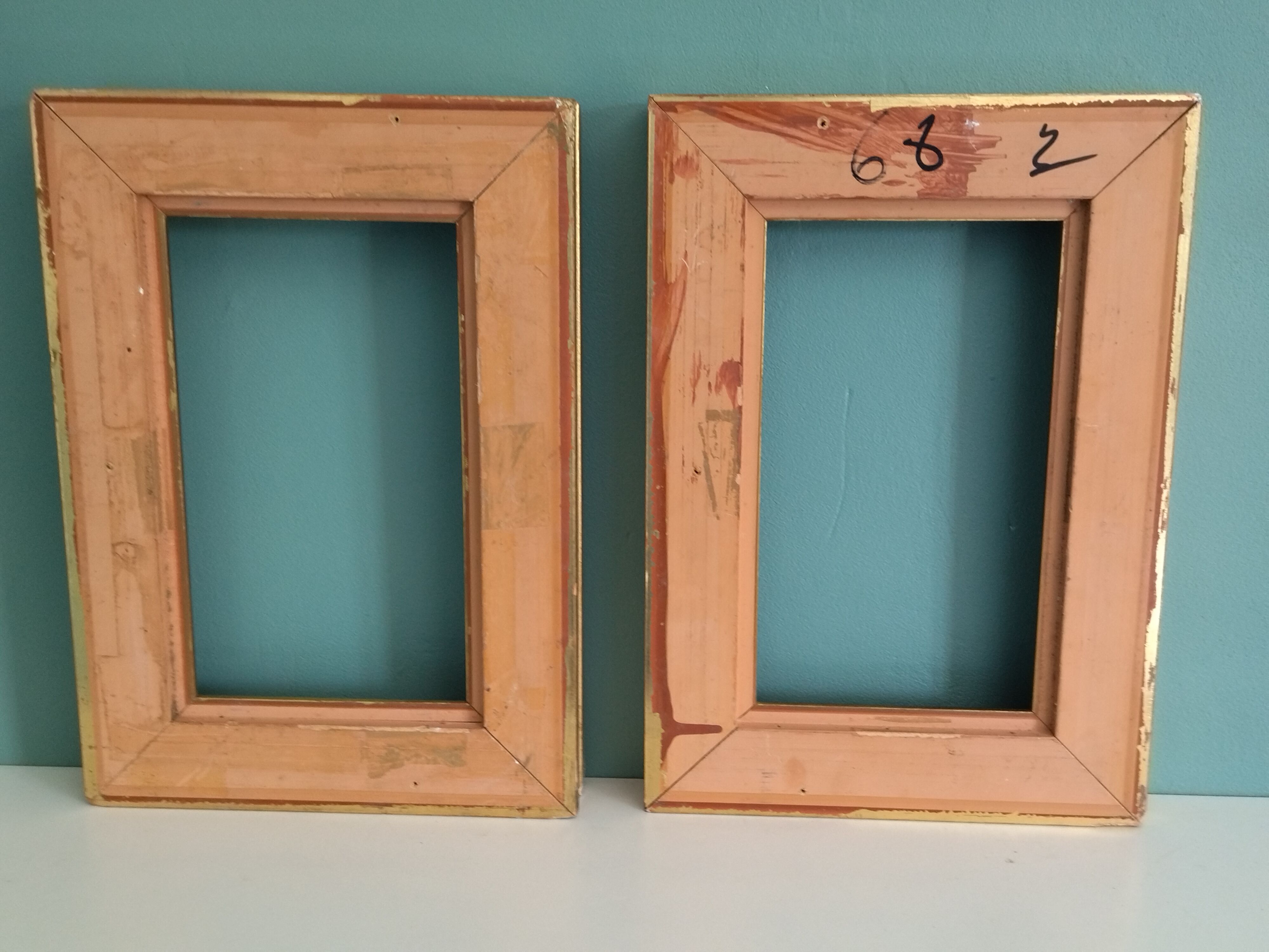 Pair of frames in old carved wood