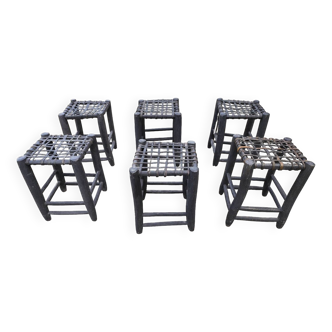 6 wooden stools with woven leather seats from Nina Kaufmann