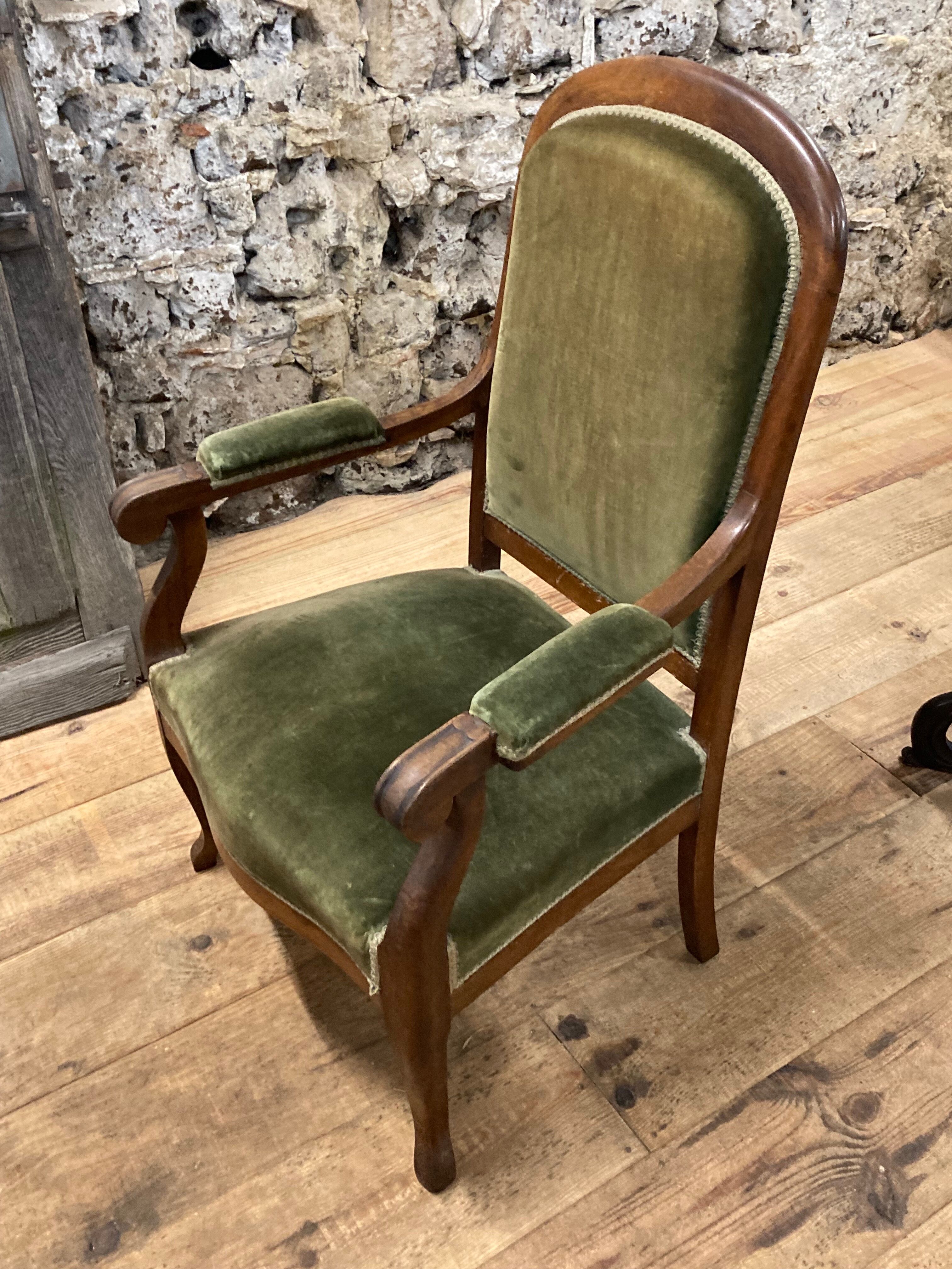 Antique Voltaire armchair in wood and green velvet Louis Philippe
