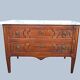 Commode sauteuse Louis XVI en bois fruitier