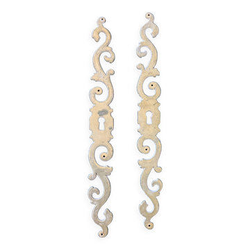 Pair of brass keyholes