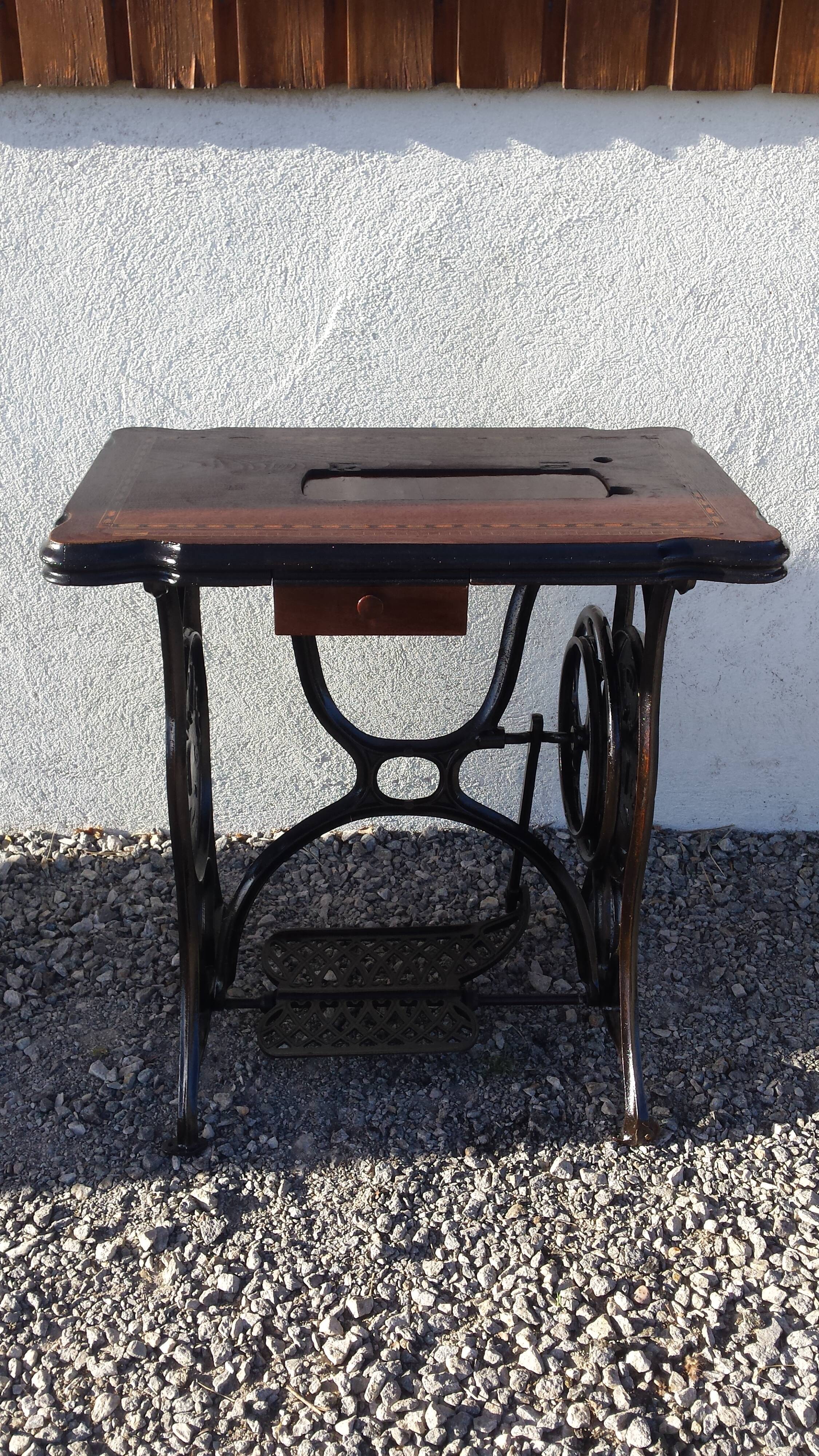 standing console of an old sewing machine