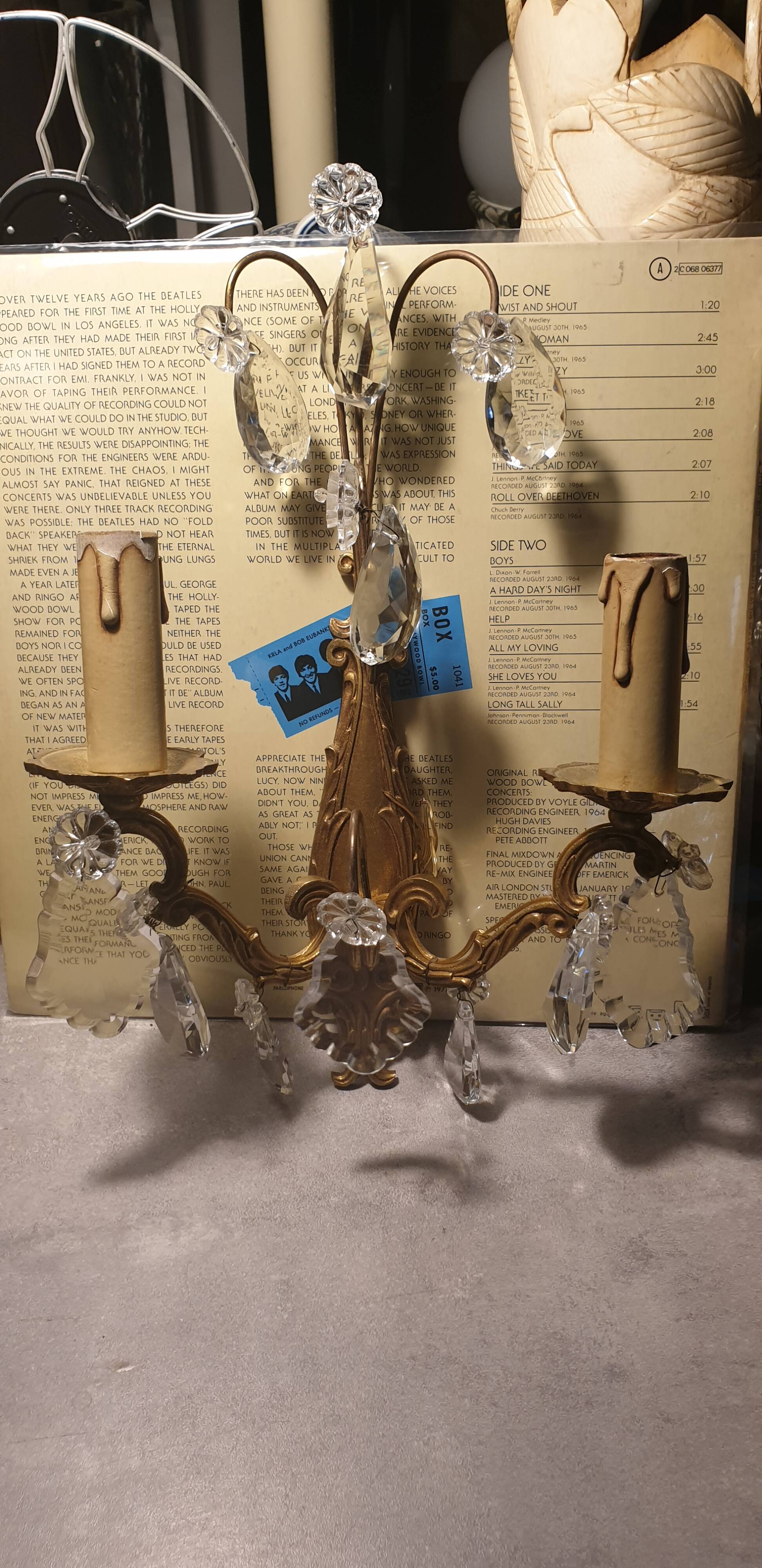 1 crystal prism wall light with 2 lights. Brass frame