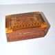 Vintage wooden box with straw marquetry and mother-of-pearl decoration.