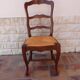 6 straw oak chairs