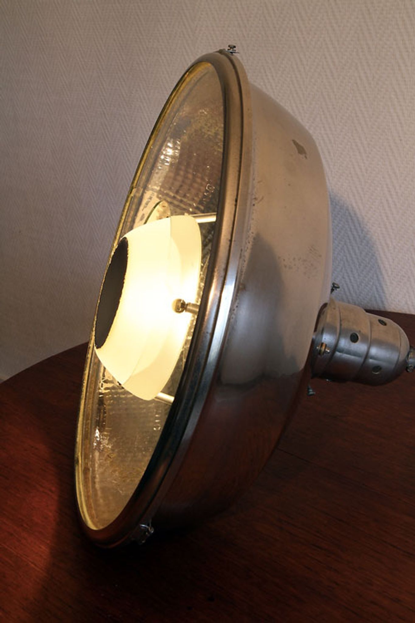 Old Bauhaus lamp in mercurized glass chrome industrial suspension.