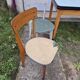 Vintage Scandinavian table and chair set with a wooden frame and formica top.