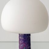 Mid-century modern table lamp by Jaap Ravelli, ceramic base and glass shade.