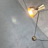 Minimalist brass floor lamp from the mid-century by Dieter Schulz for Wohnbedarf Ag, 1950s.