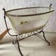 Antique rocking cradle in wrought iron