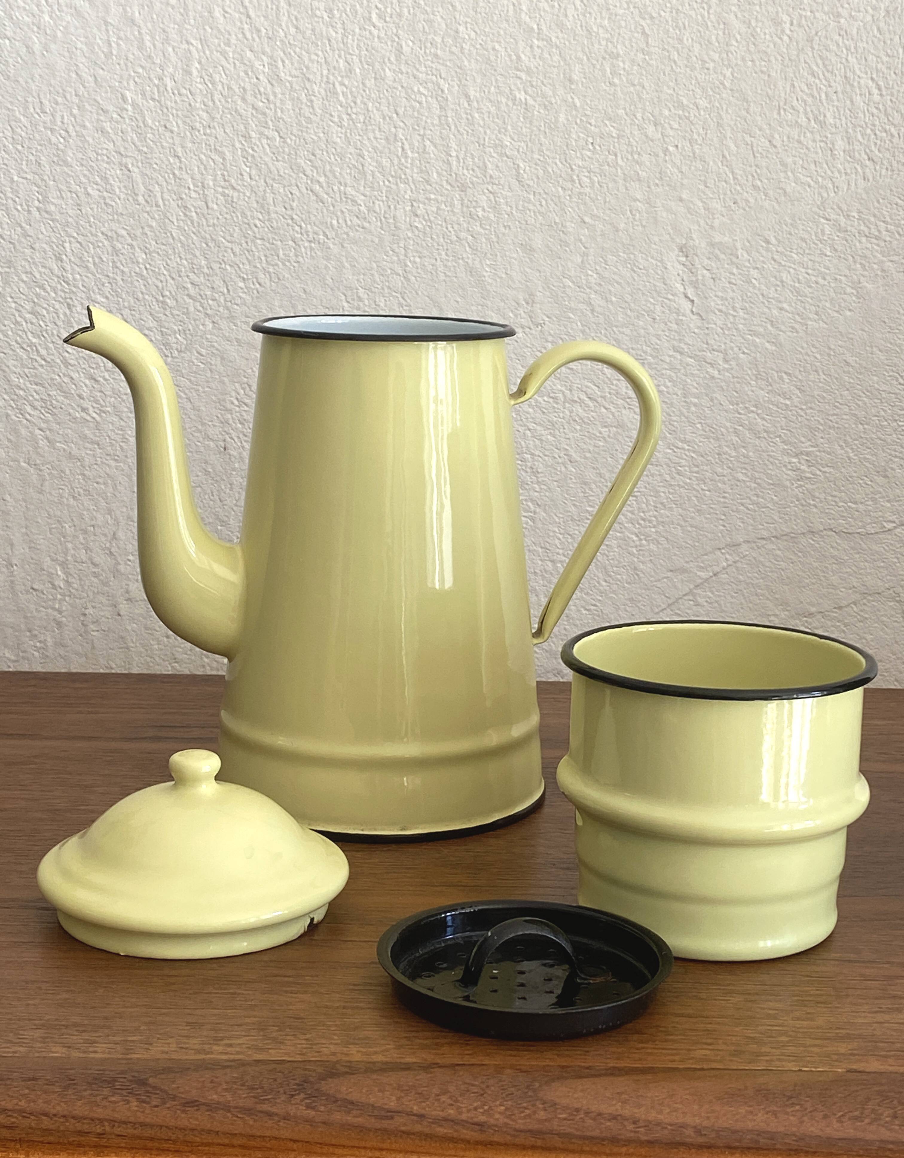 Large vintage coffee pot in pale yellow enamel.
