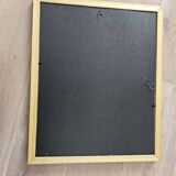 Golden frame with purple floral patterns