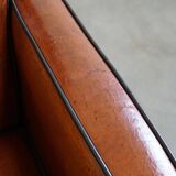 Cognac-colored sheepskin Art Deco design armchair in good condition
