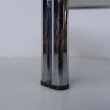 Coffee table with smoked glass top in chromed frame