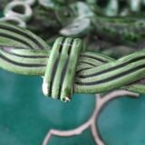 Antique woven basket in green glazed ceramic, fish decoration