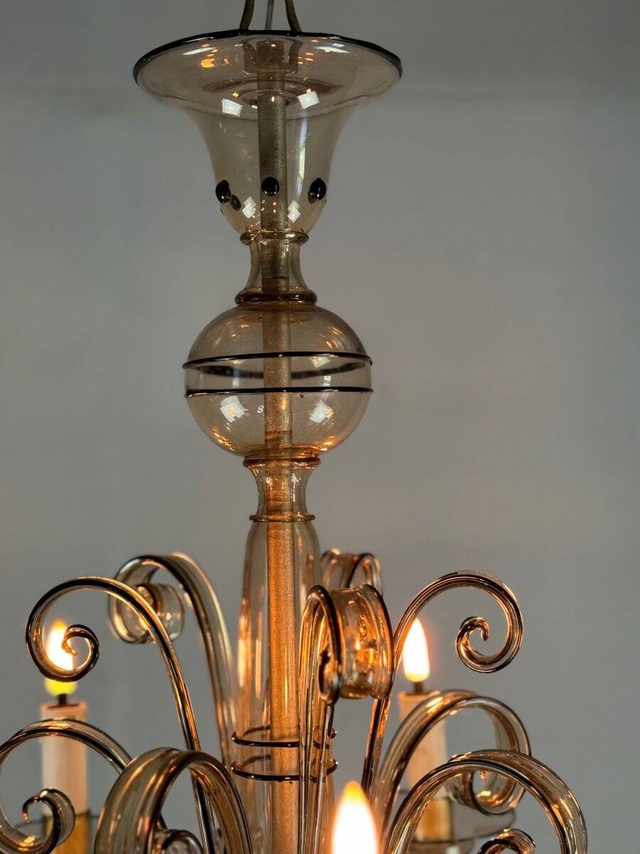 Venetian chandelier in golden Murano glass with a black border, circa 1950