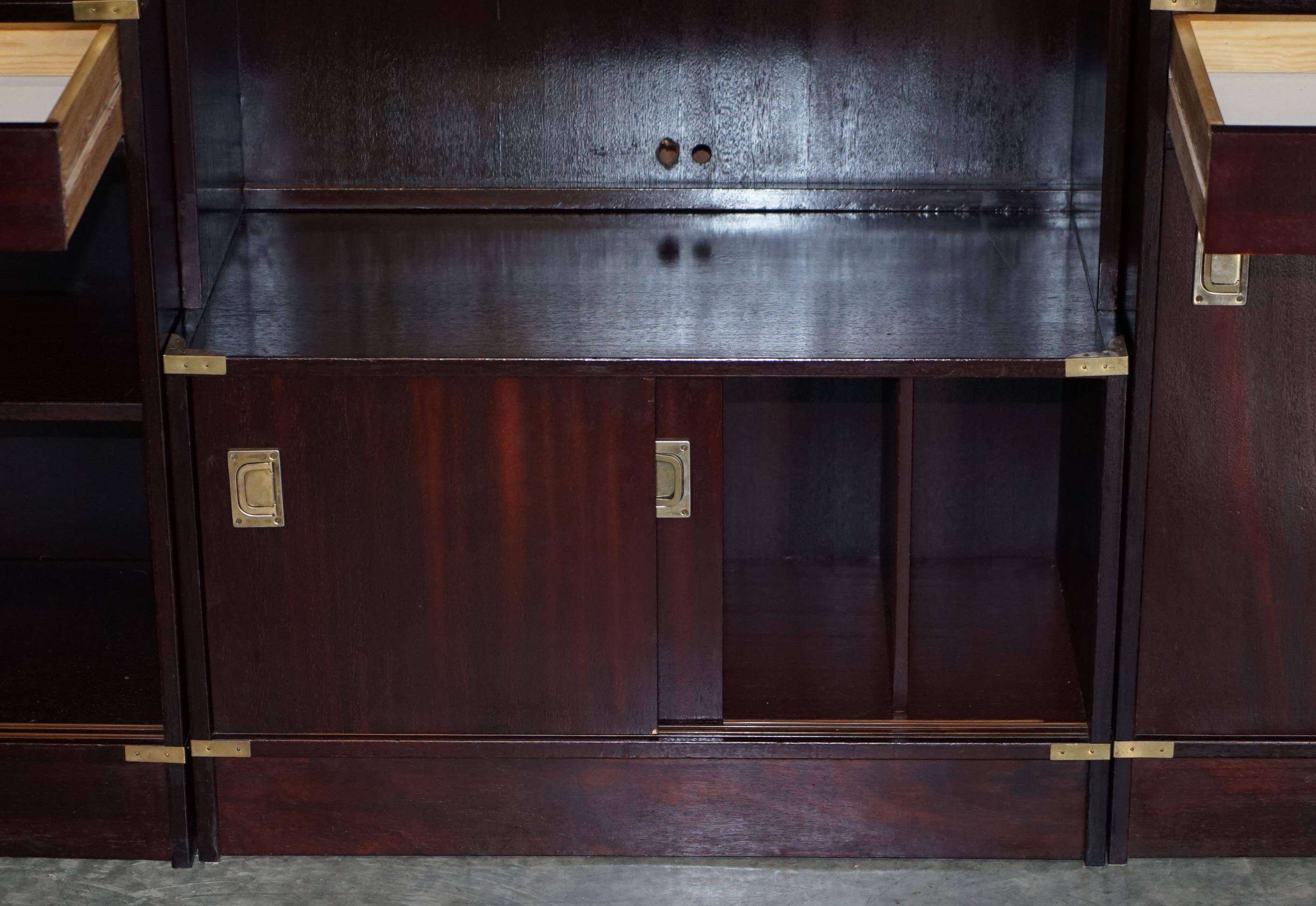 Three vintage style Military Campaign bookshelves, mahogany finish.