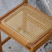 Série de 4 chaises vintage en pin assise cannage