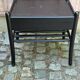 Vintage bedside table from the 1980s in black wood.
