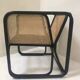 Fauteuil en rotin laqué noir et cannage naturel