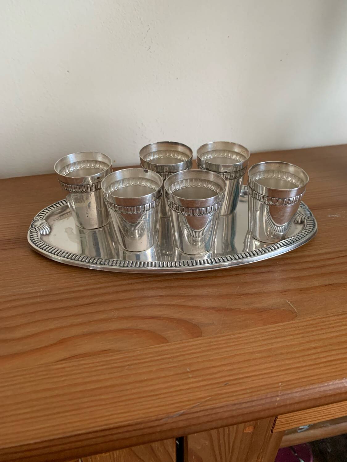 Vodka shot liqueur service in vintage silver metal