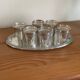 Vodka shot liqueur service in vintage silver metal