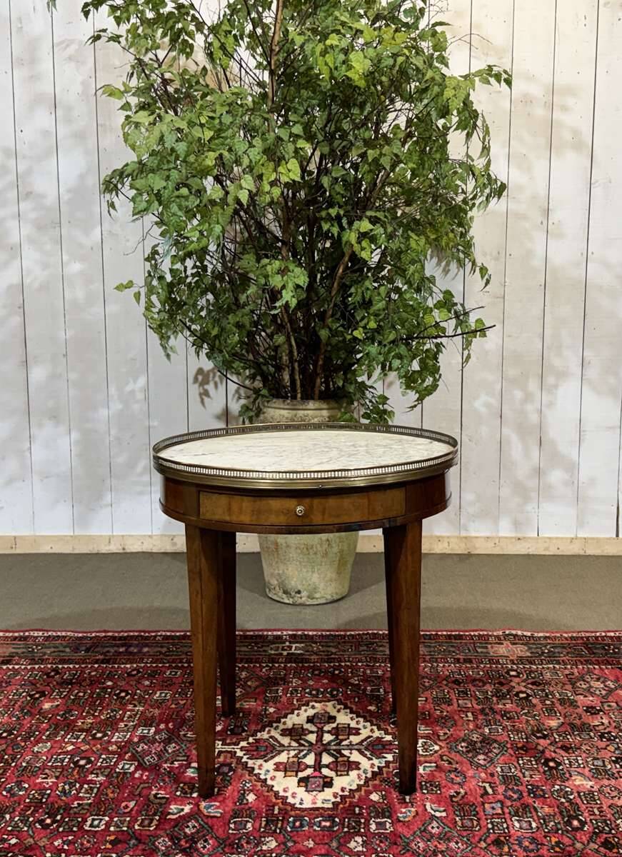 Louis XVI style bouillotte table in mahogany with a white marble top.