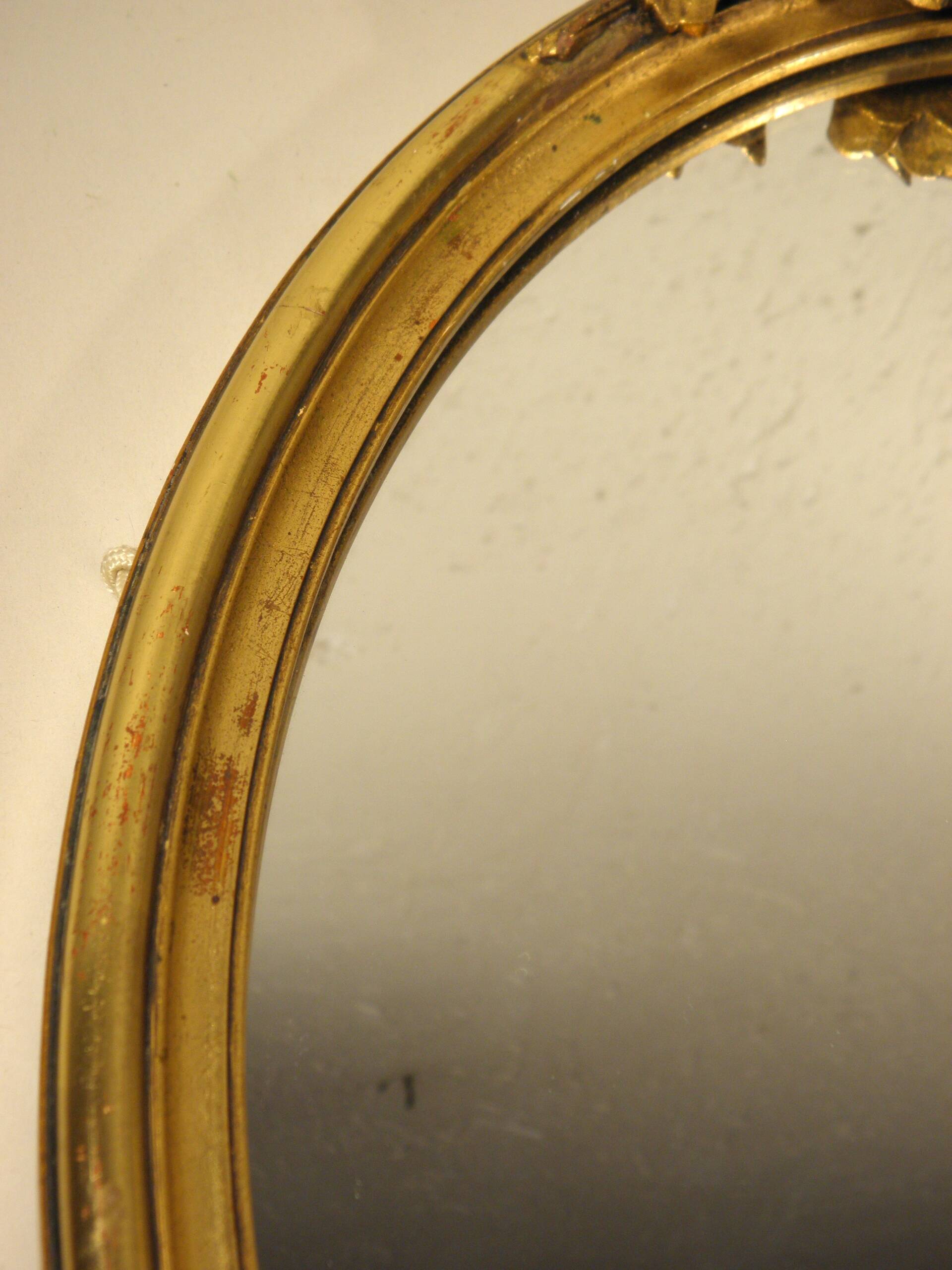 Oval gilded wood mirror 45 x 34