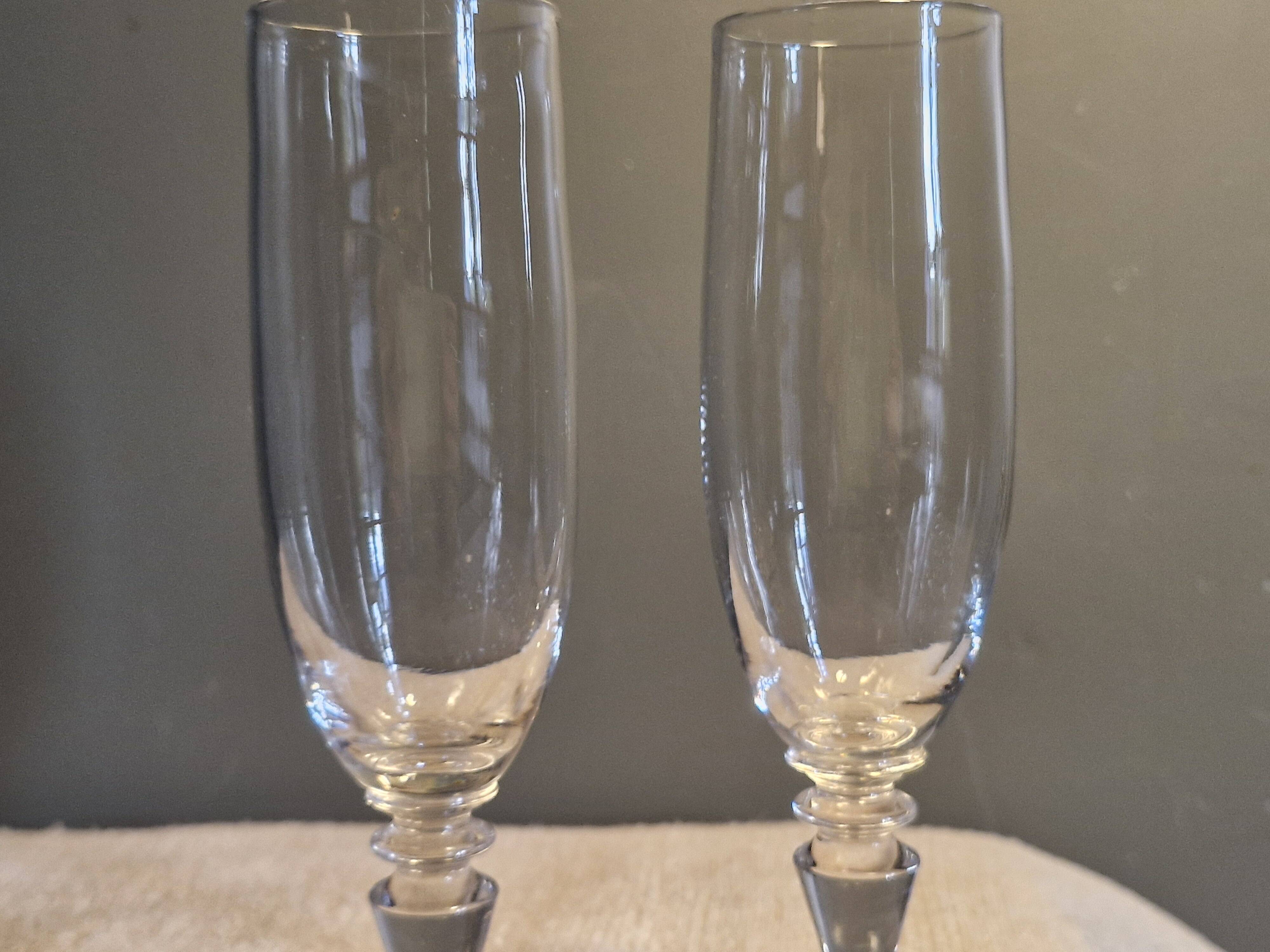 2 antique crystal champagne flutes