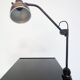 Industrial in height to be adjusted vintage clamp lamp from the 1970s