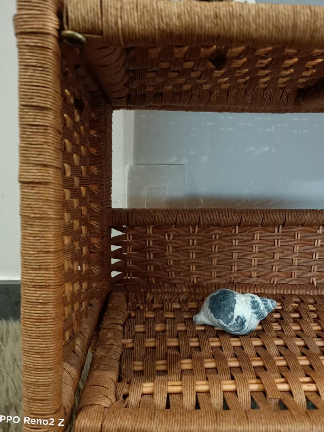 Folding rattan shelf
