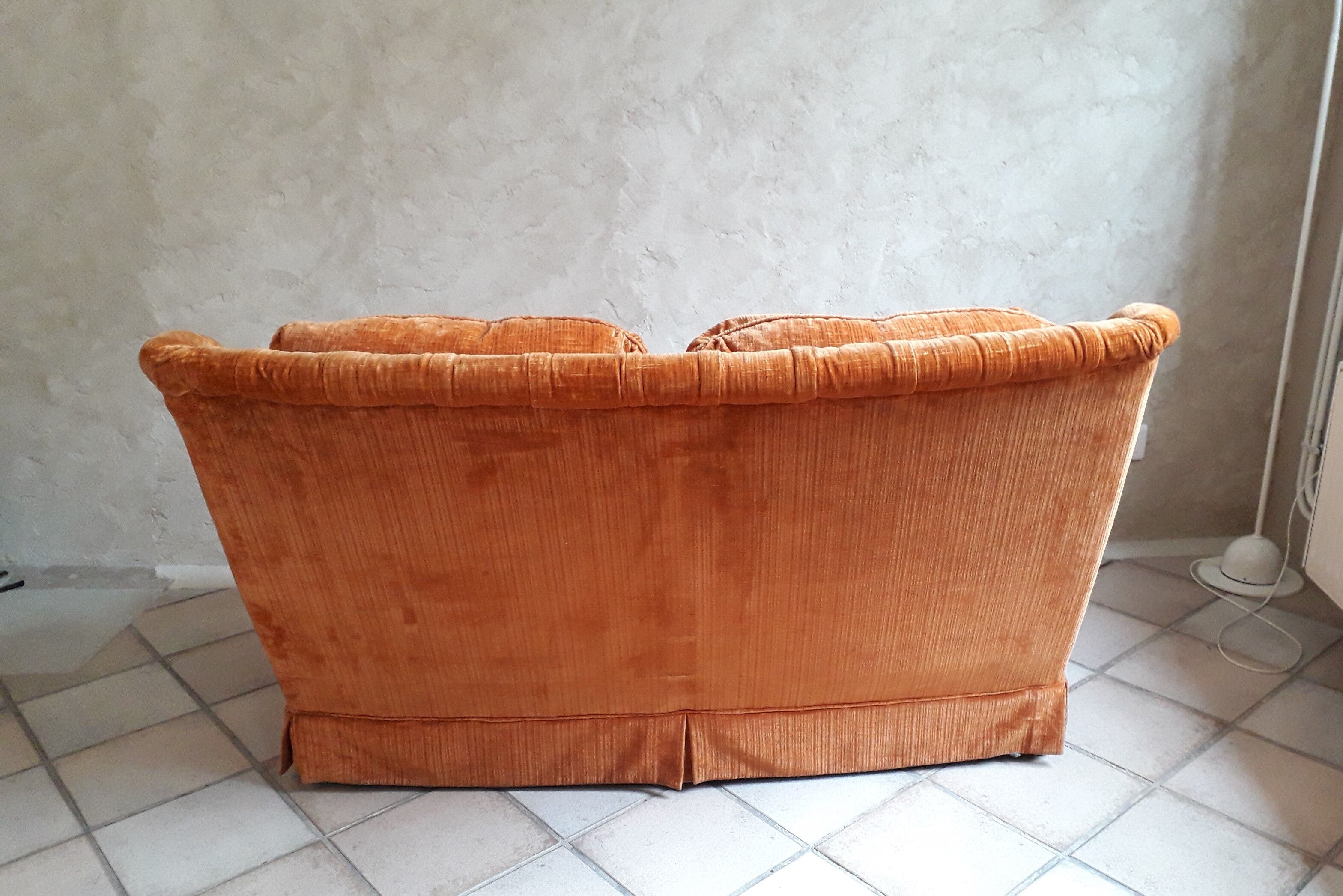 Orange velvet two-seat sofa