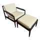 Scandinavian armchairs in solid teak with ottoman from the 1960s.