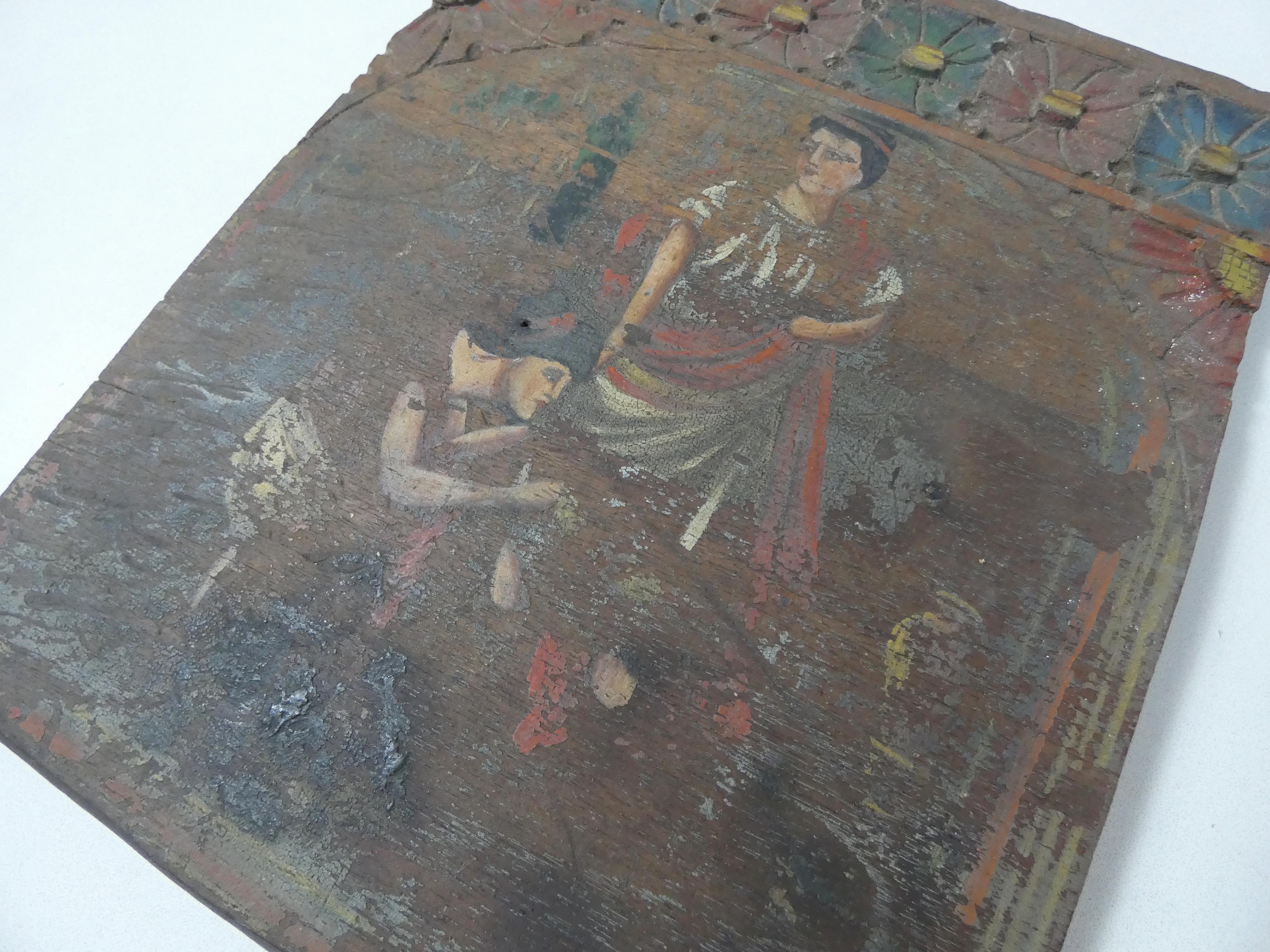 Painting on carved wood panel