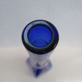 Blue glass bottle, square