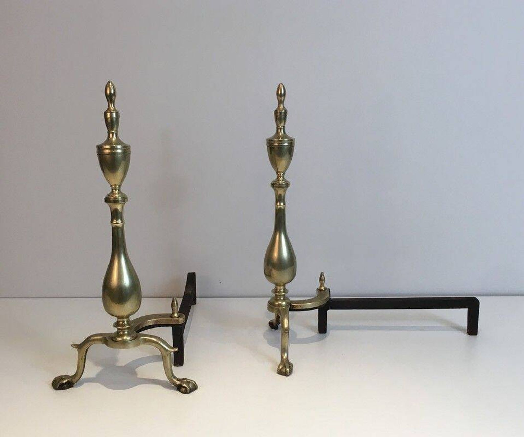 Pair of neo-Gothic bronze and wrought iron andirons
