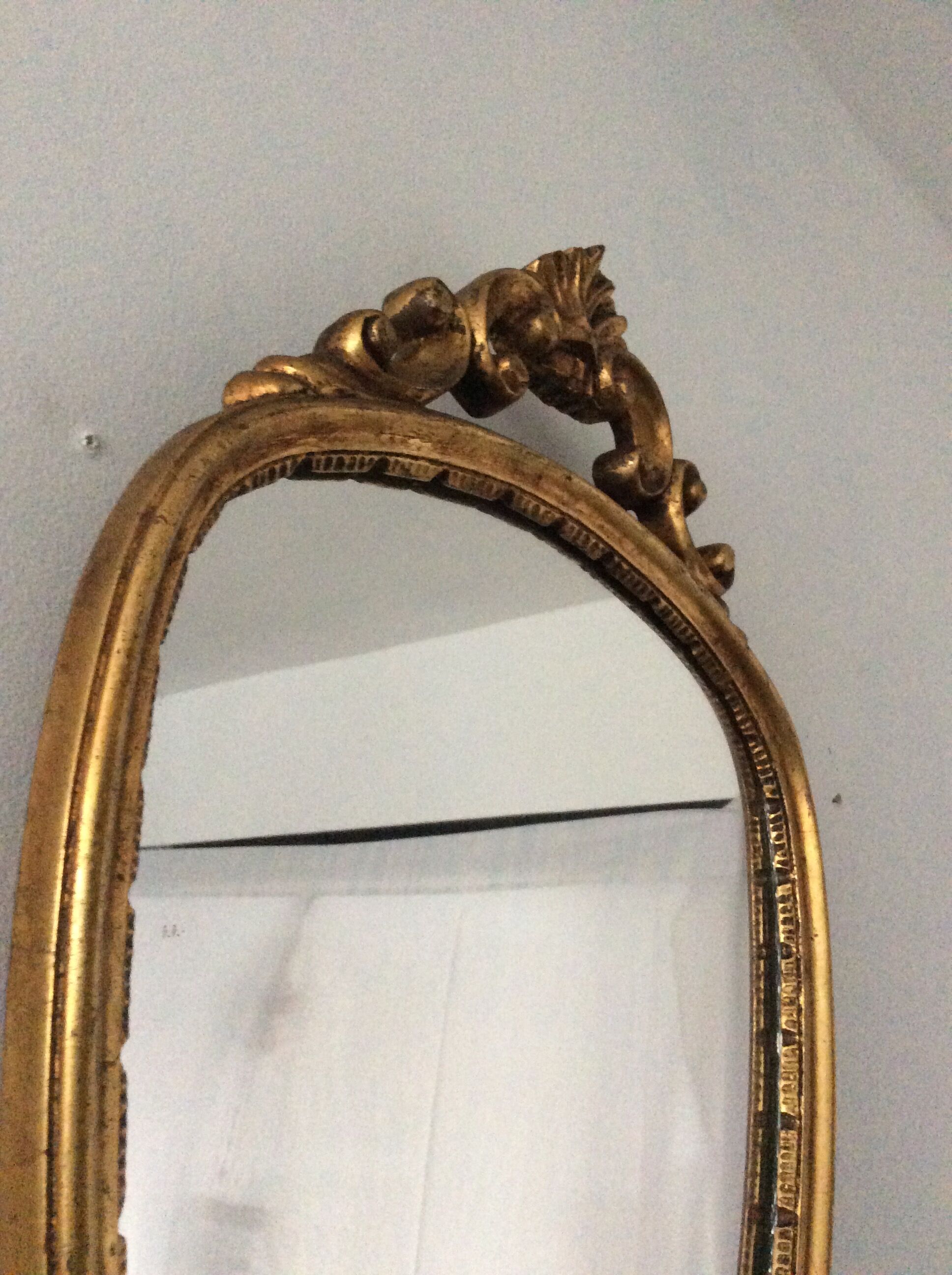 Old vintage mirror in gilded wood