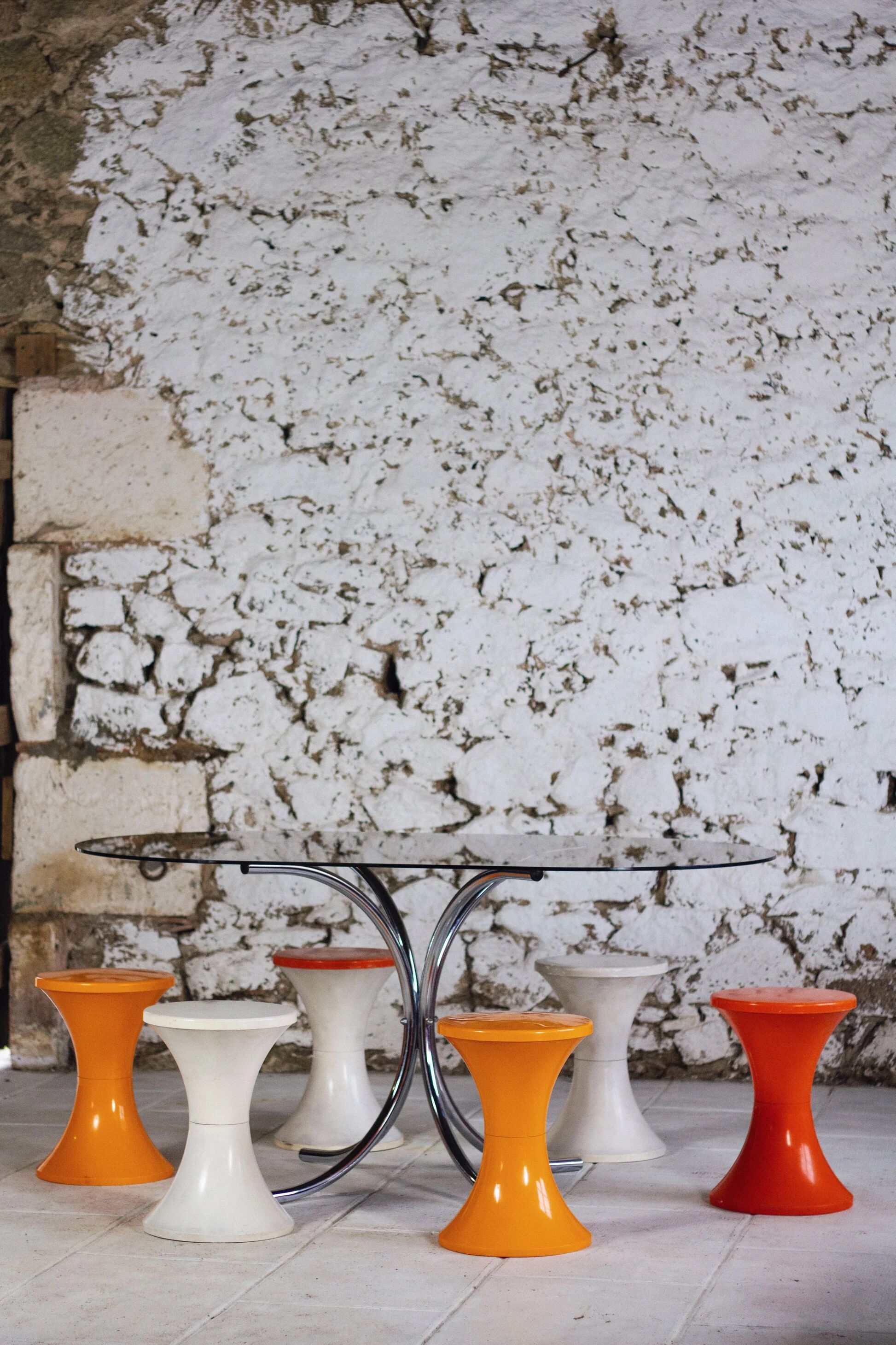 Oval dining table in chrome and smoked glass, 1970.