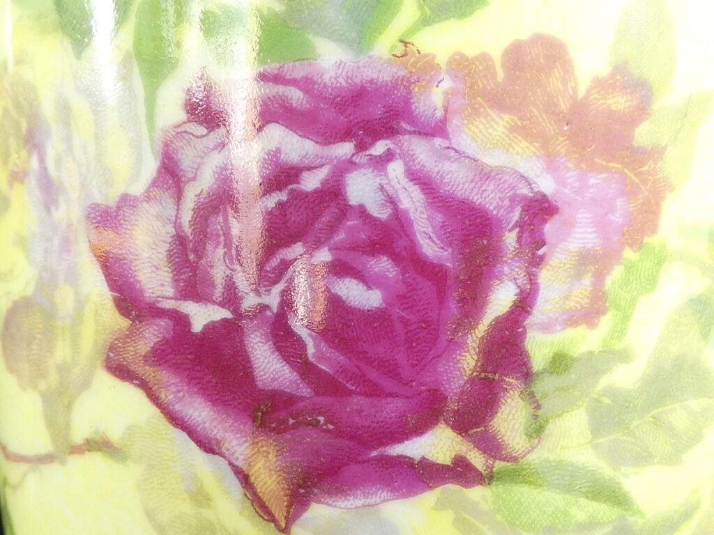 Pair of Limoges porcelain vases decorated with rose bushes