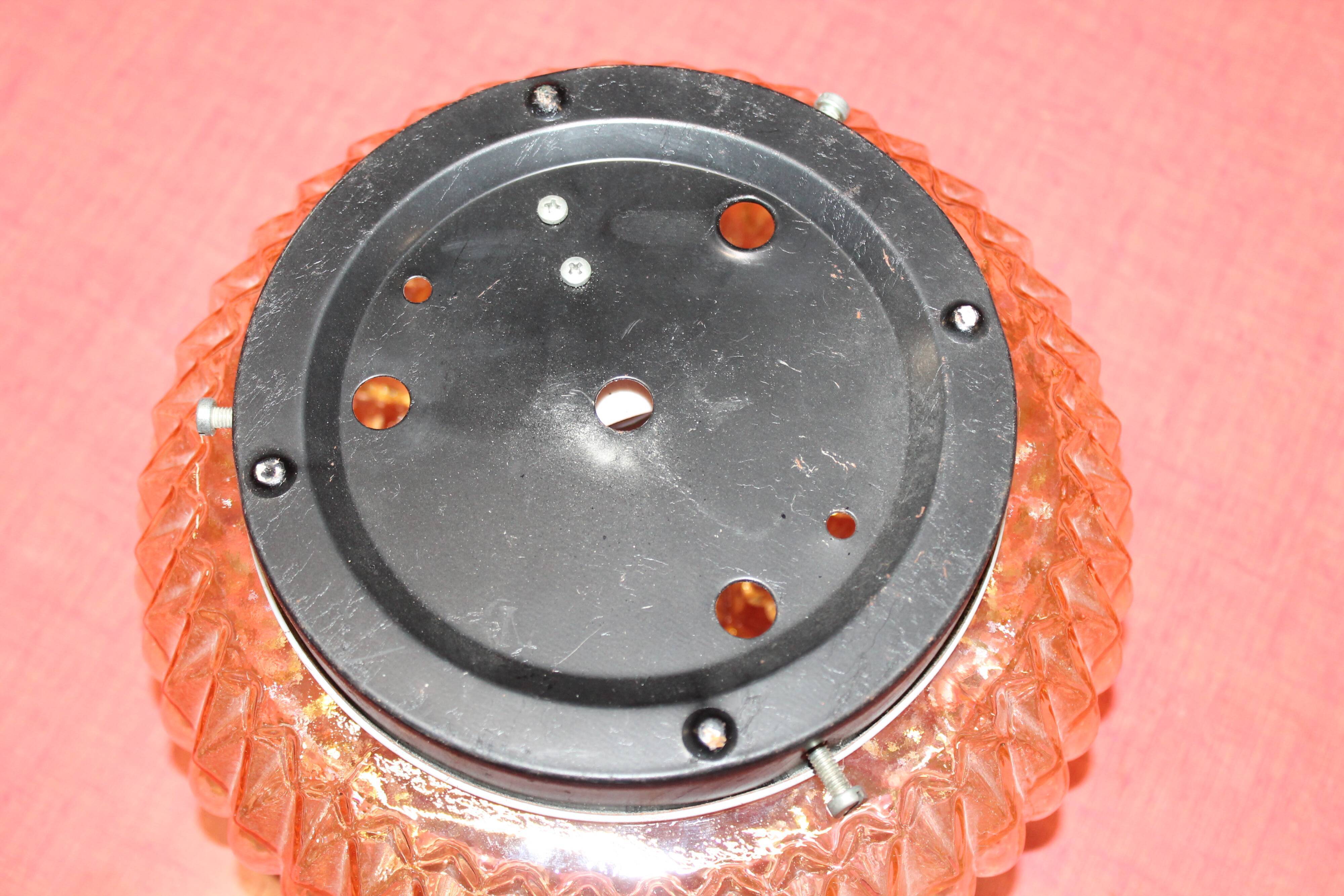 Moulded glass wall sconce