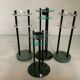 Four postmodernist green marble candlesticks